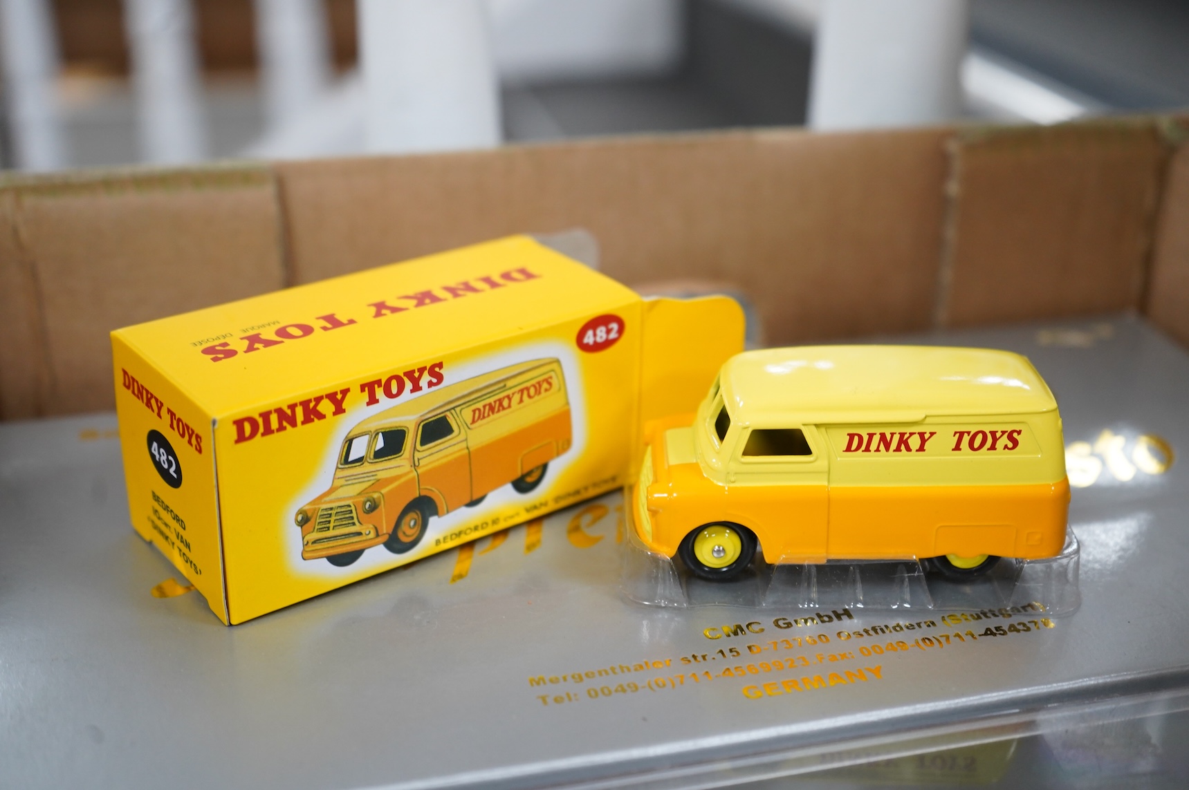 A collection of diecast vehicles, including a boxed CMC 1:18 scale Mercedes Benz W196 1950s single seat racing car, together with five boxed early Matchbox Models of Yesteryear, two Atlas Dinkies, a 1:18 scale Bburago Bu